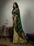 Stone Green Organza Silk saree with detailed weaving work and tassel accents