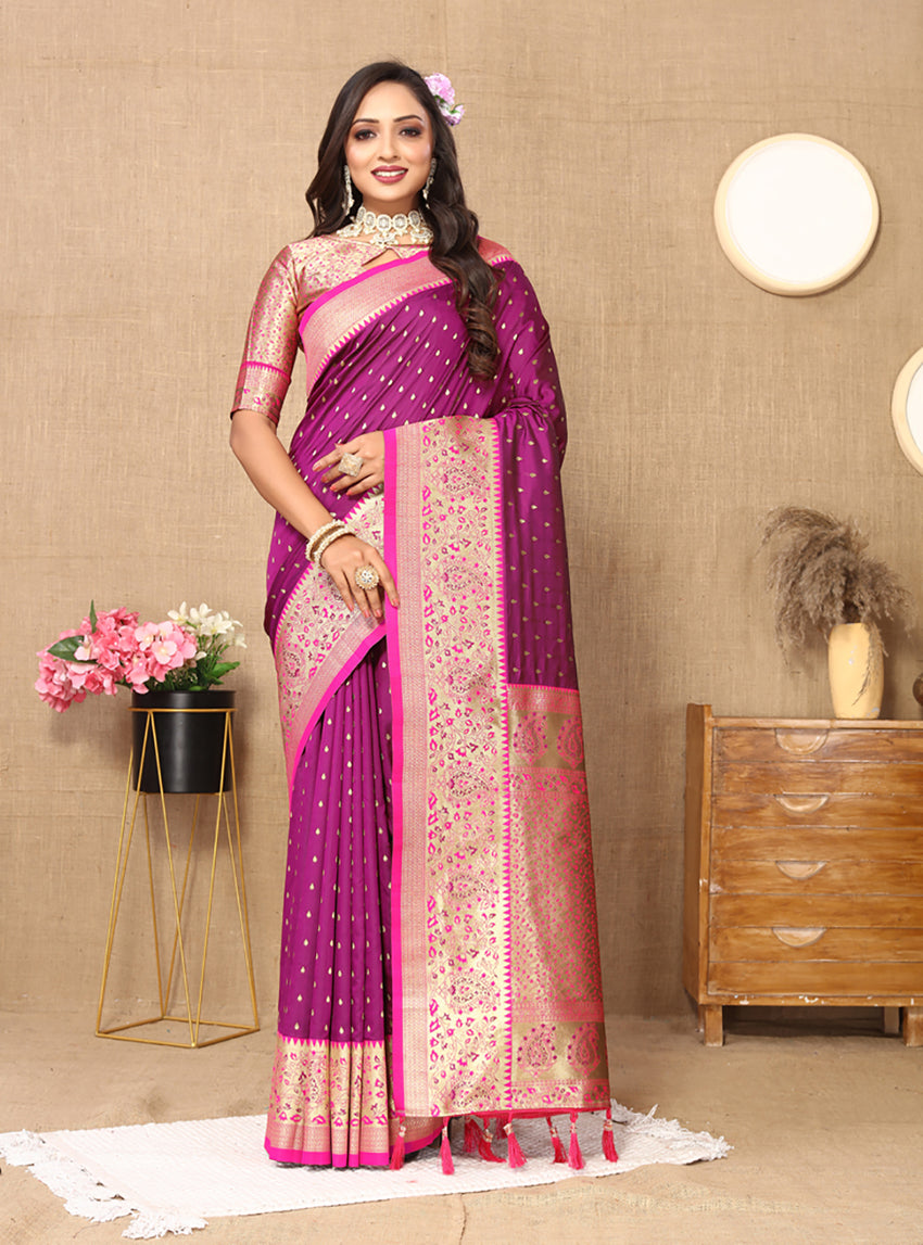 Magenta Soft Silk Saree with detailed Zari weaving and matching blouse.