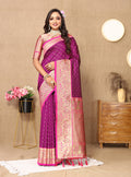 Magenta Soft Silk Saree with detailed Zari weaving and matching blouse.
