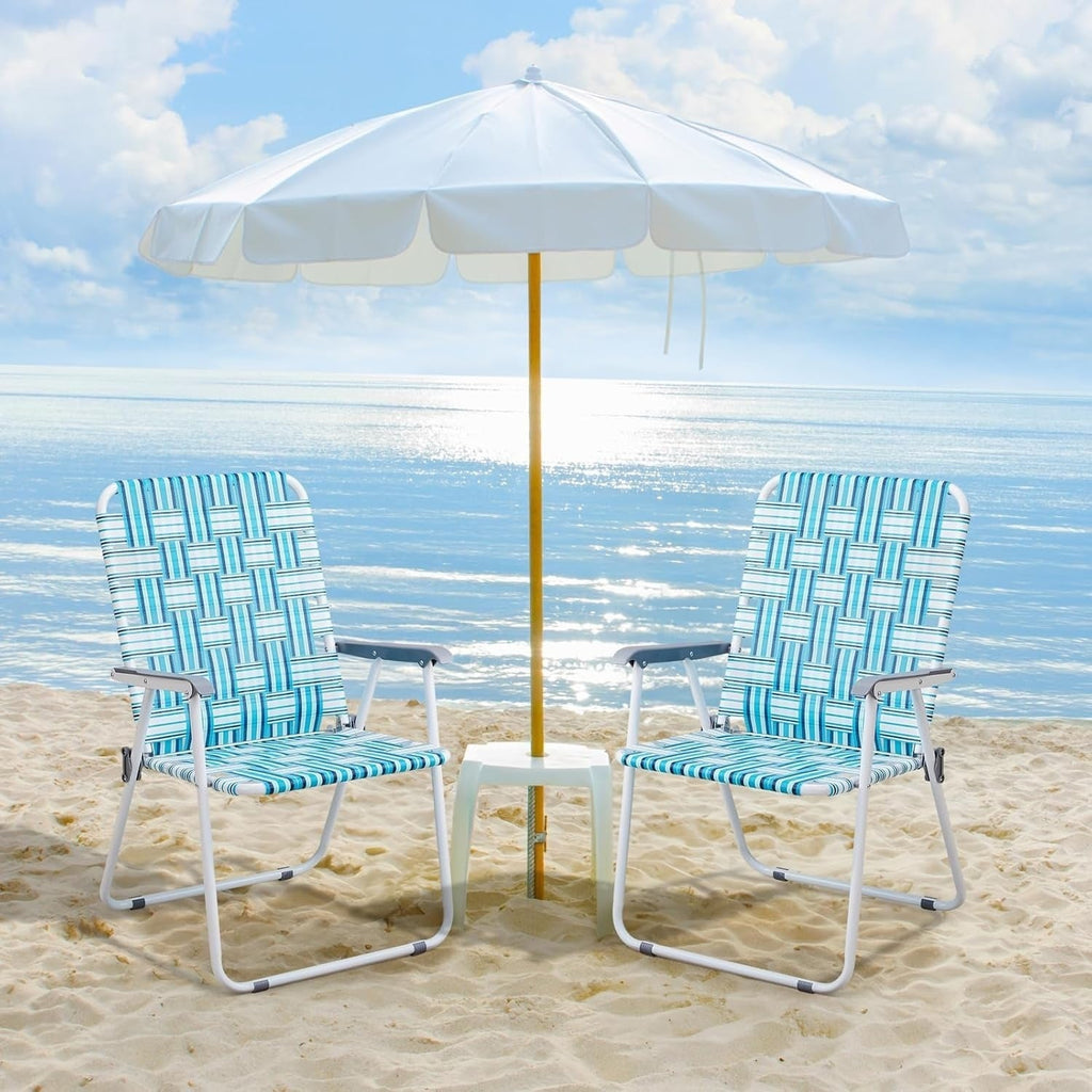 Set of two folding outdoor beach chairs with steel frames and webbed seats