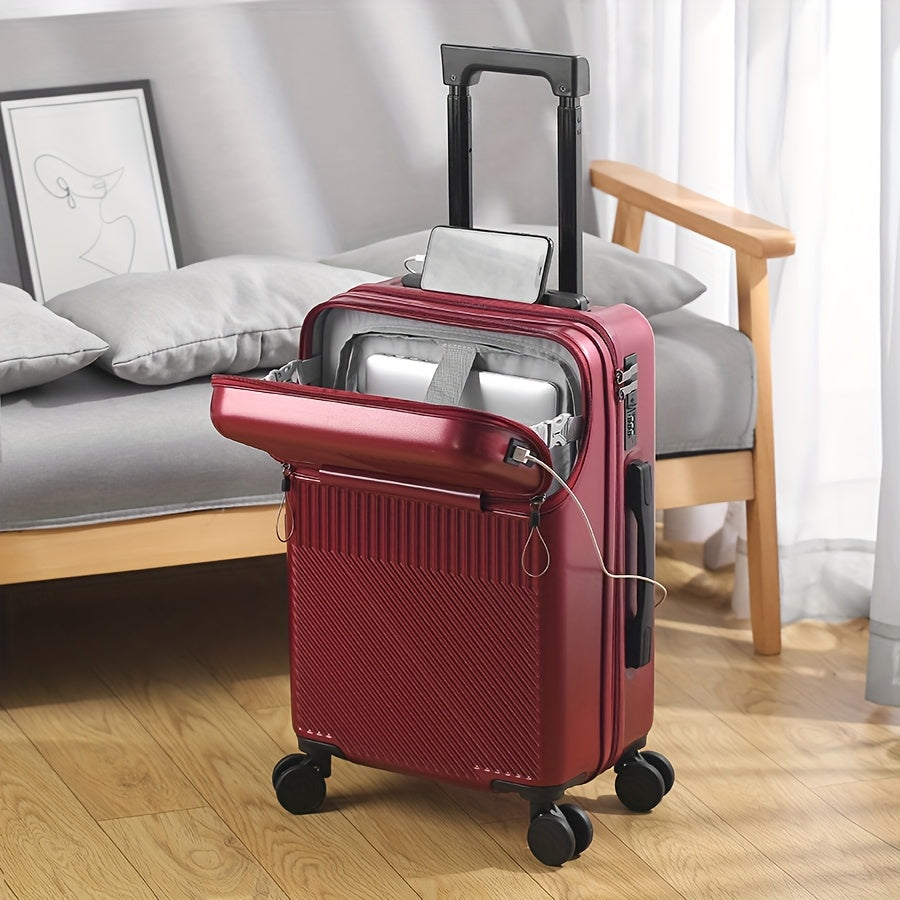 Modern hard shell carry-on spinner suitcase with diagonal ribbing and front laptop access pocket