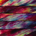 Skeins of Malabrigo Arroyo yarn in rich, hand-dyed colors.