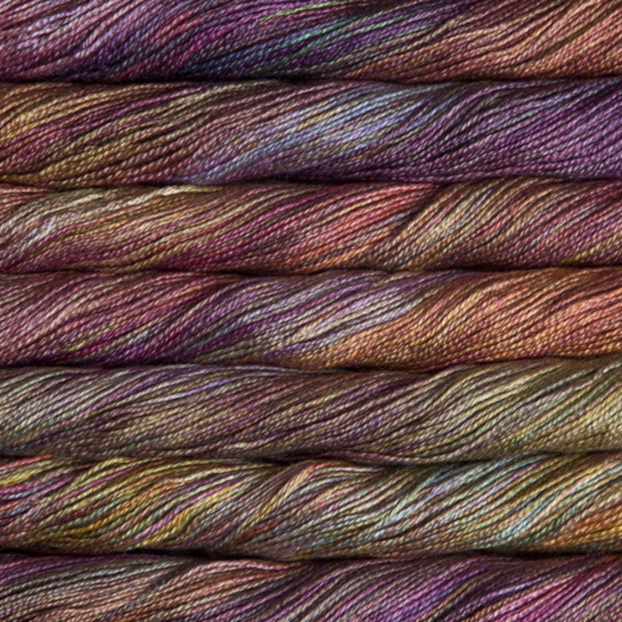 Skein of Malabrigo Mora 100% mulberry silk yarn displaying its characteristic sheen and 4-ply texture.