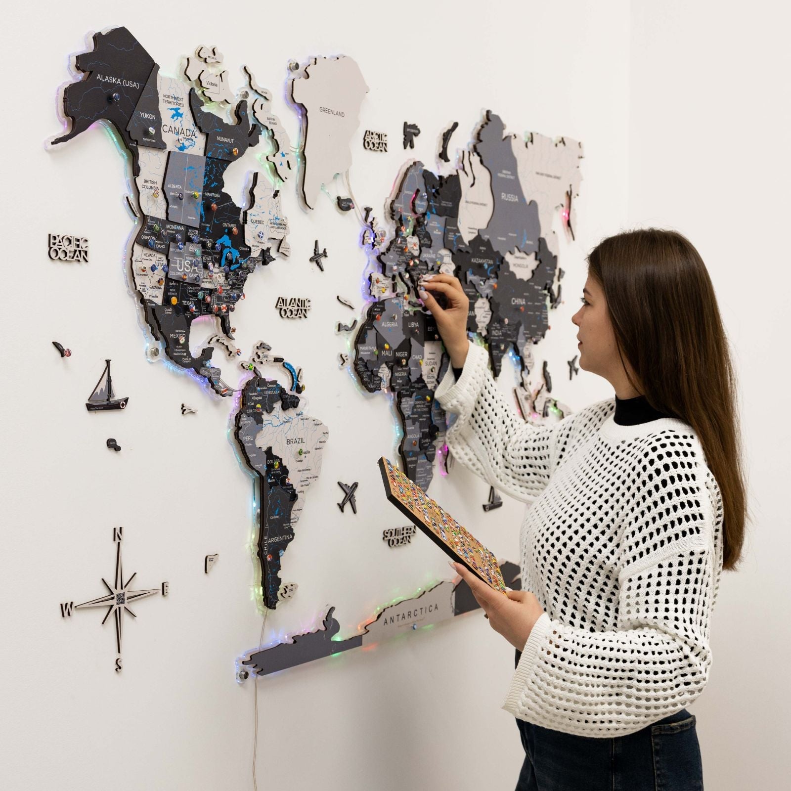 3D Luminous LED Wooden World Map 2.0 Nordik wall art with glowing continents in a minimalist interior.