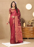 Maroon Soft Katan silk saree featuring detailed copper zari weaving