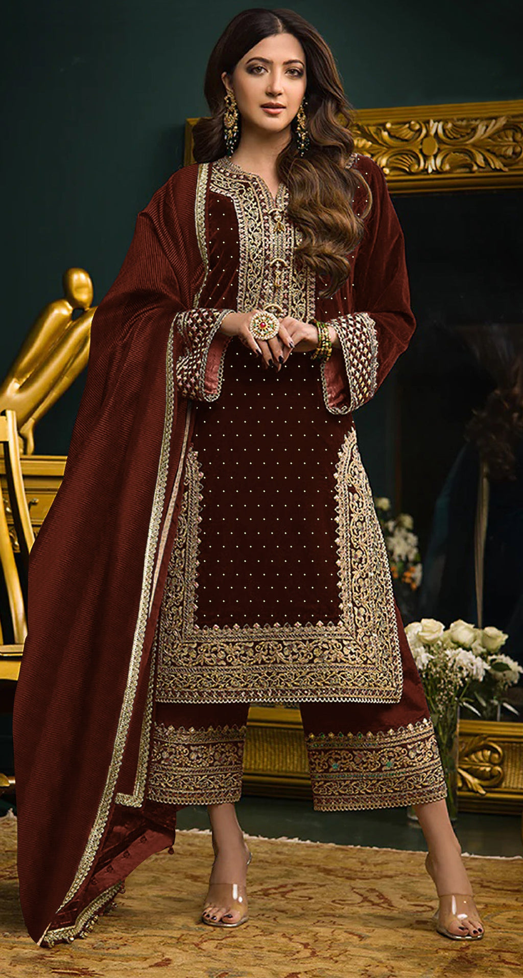 Detailed view of maroon velvet salwar suit material featuring embroidery and sequence work