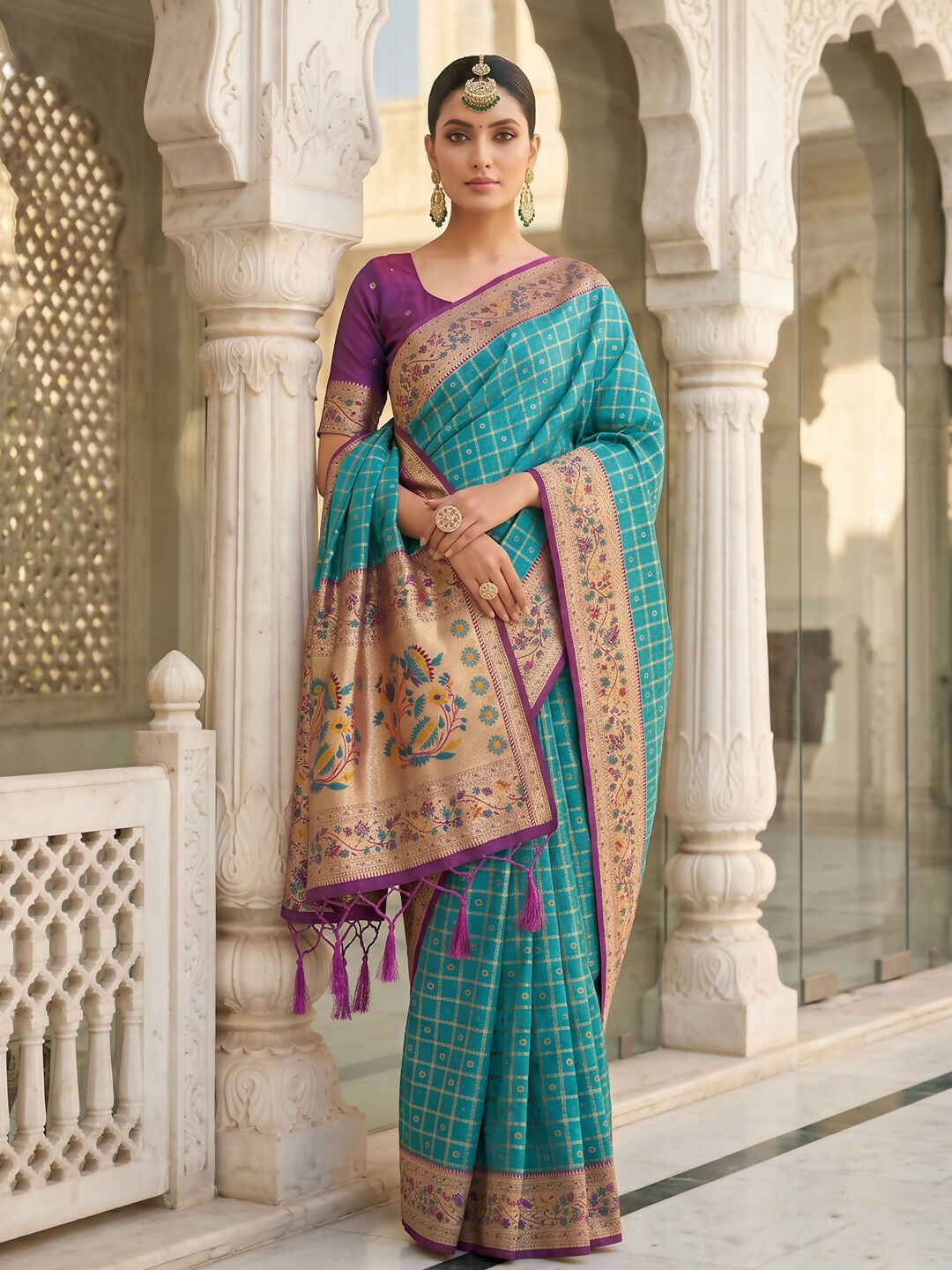 Turquoise Banarasi Silk Blend Saree draped gracefully with matching blouse piece