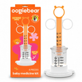4-piece light-up baby medicine dosing kit in orange, white, and clear components.