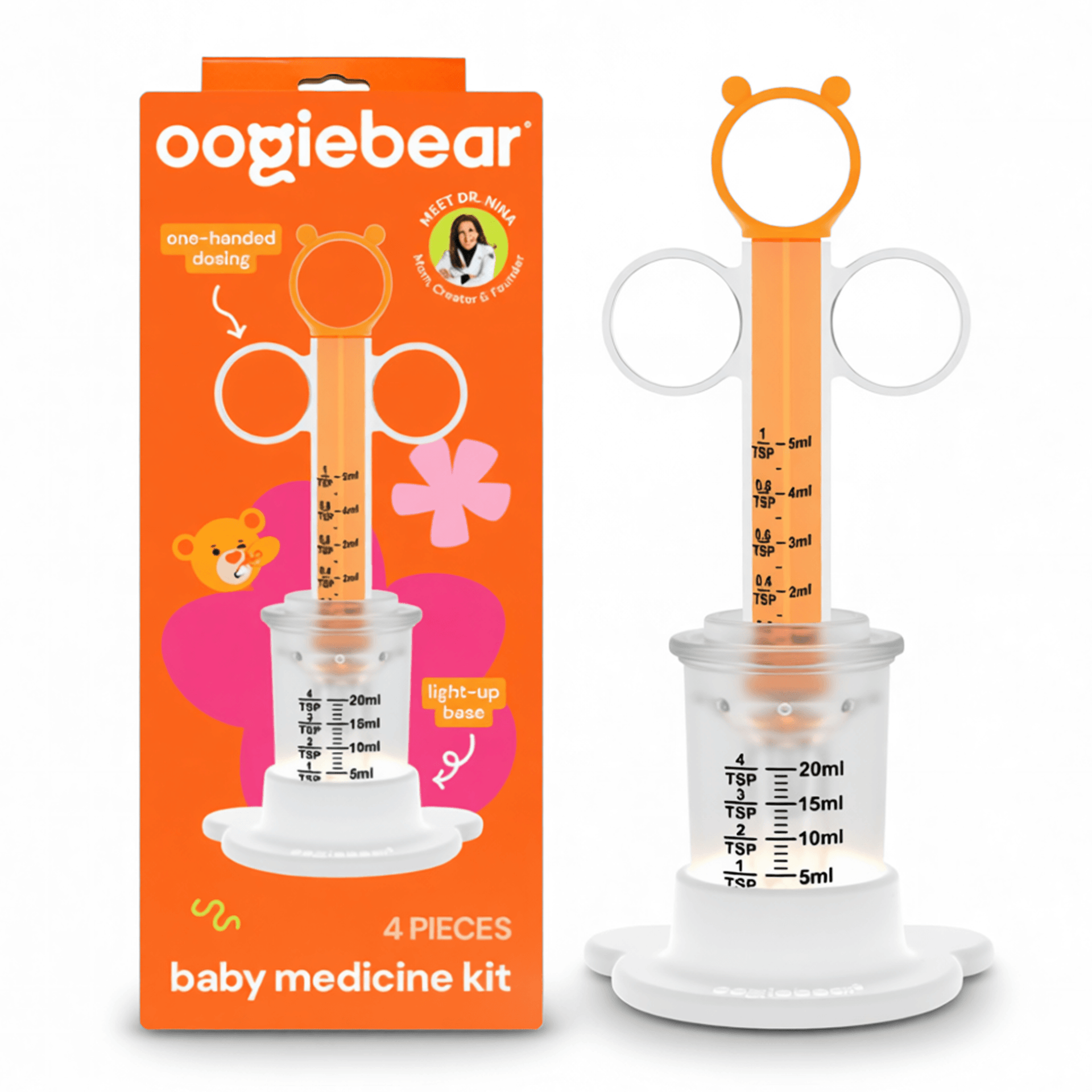 4-piece light-up baby medicine dosing kit in orange, white, and clear components.