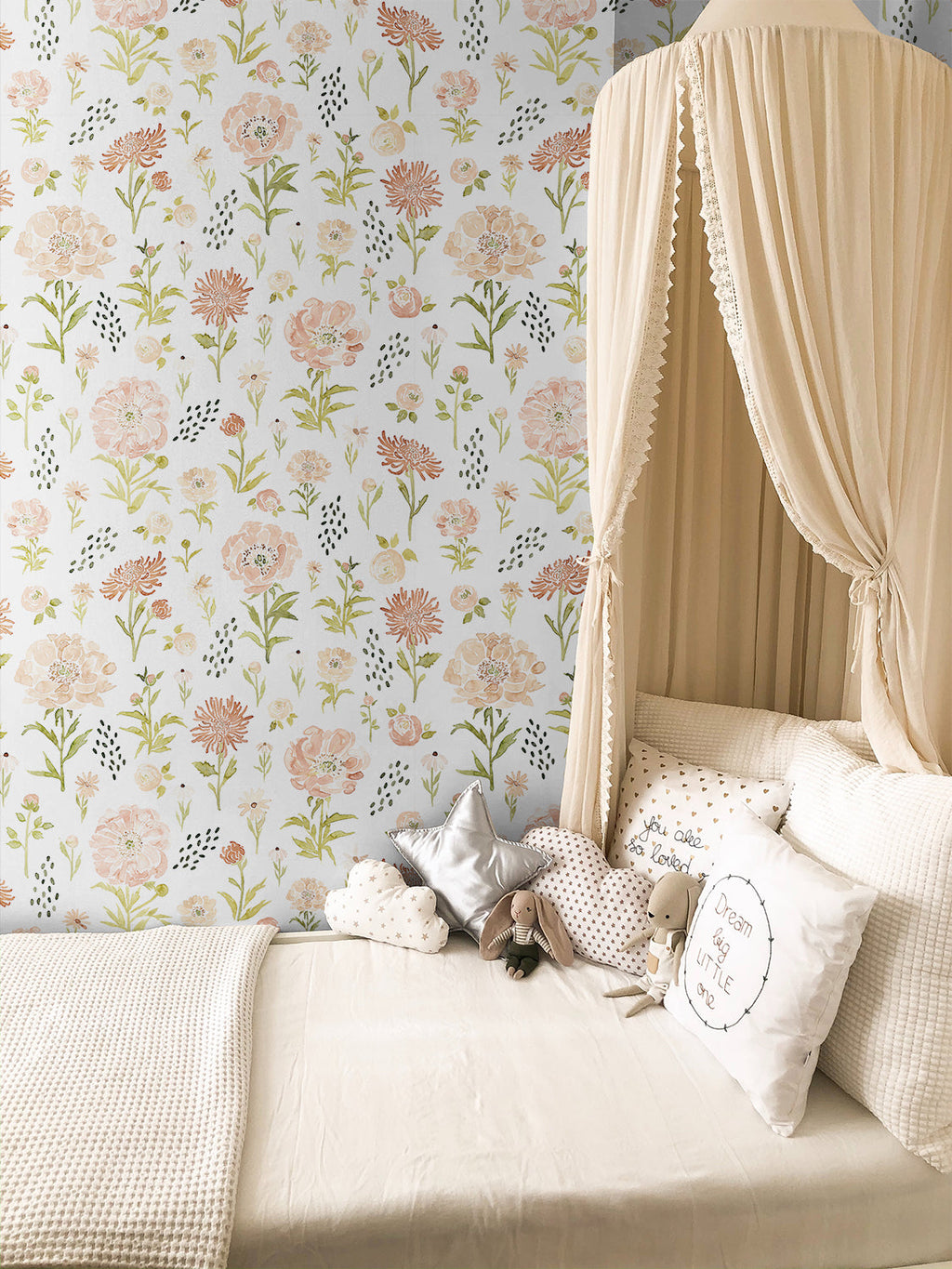 Mercedes floral pattern wallpaper in peach and sage-green for bohemian nursery decor