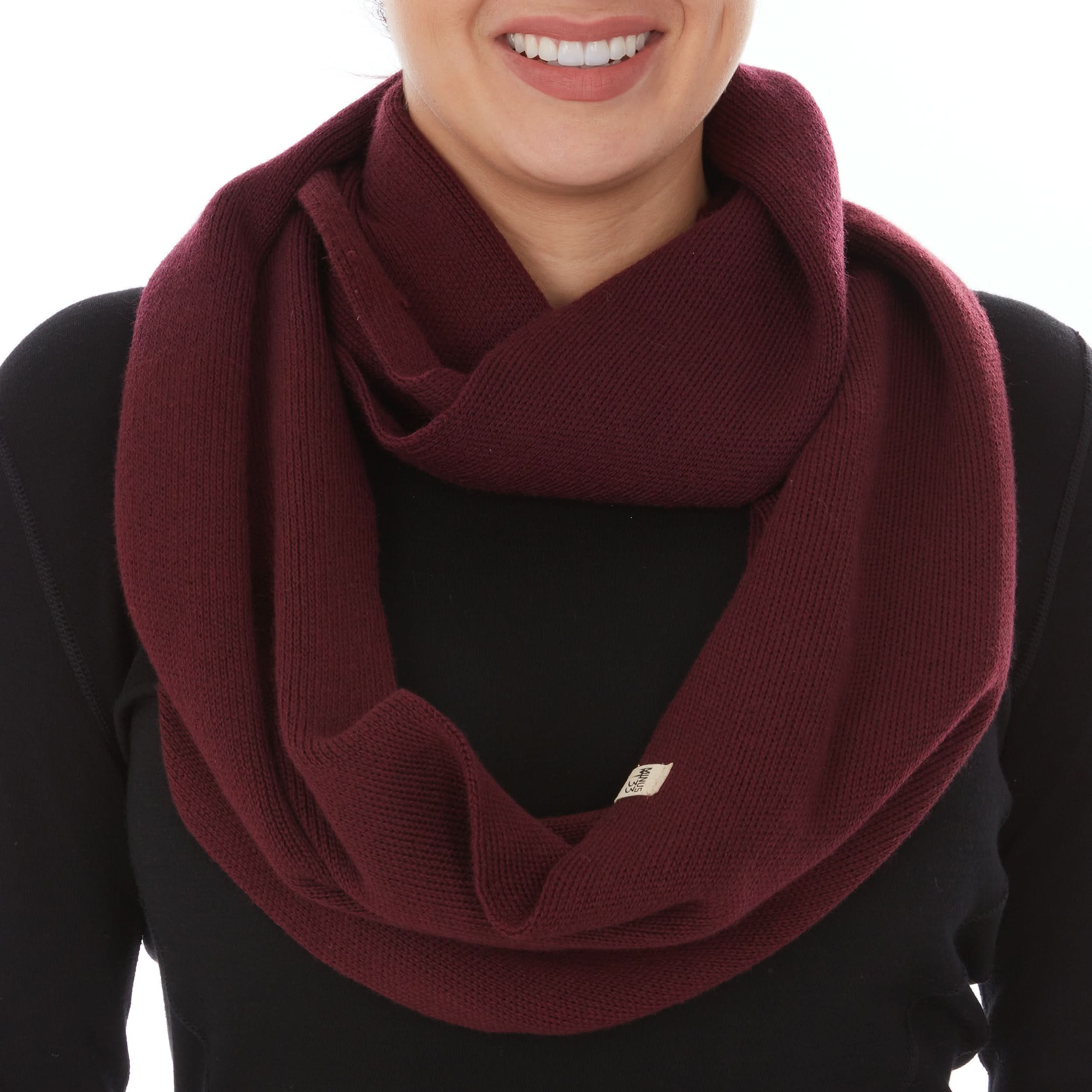 Unisex merino wool infinity loop scarf in solid burgundy, black, off-white, and grey.