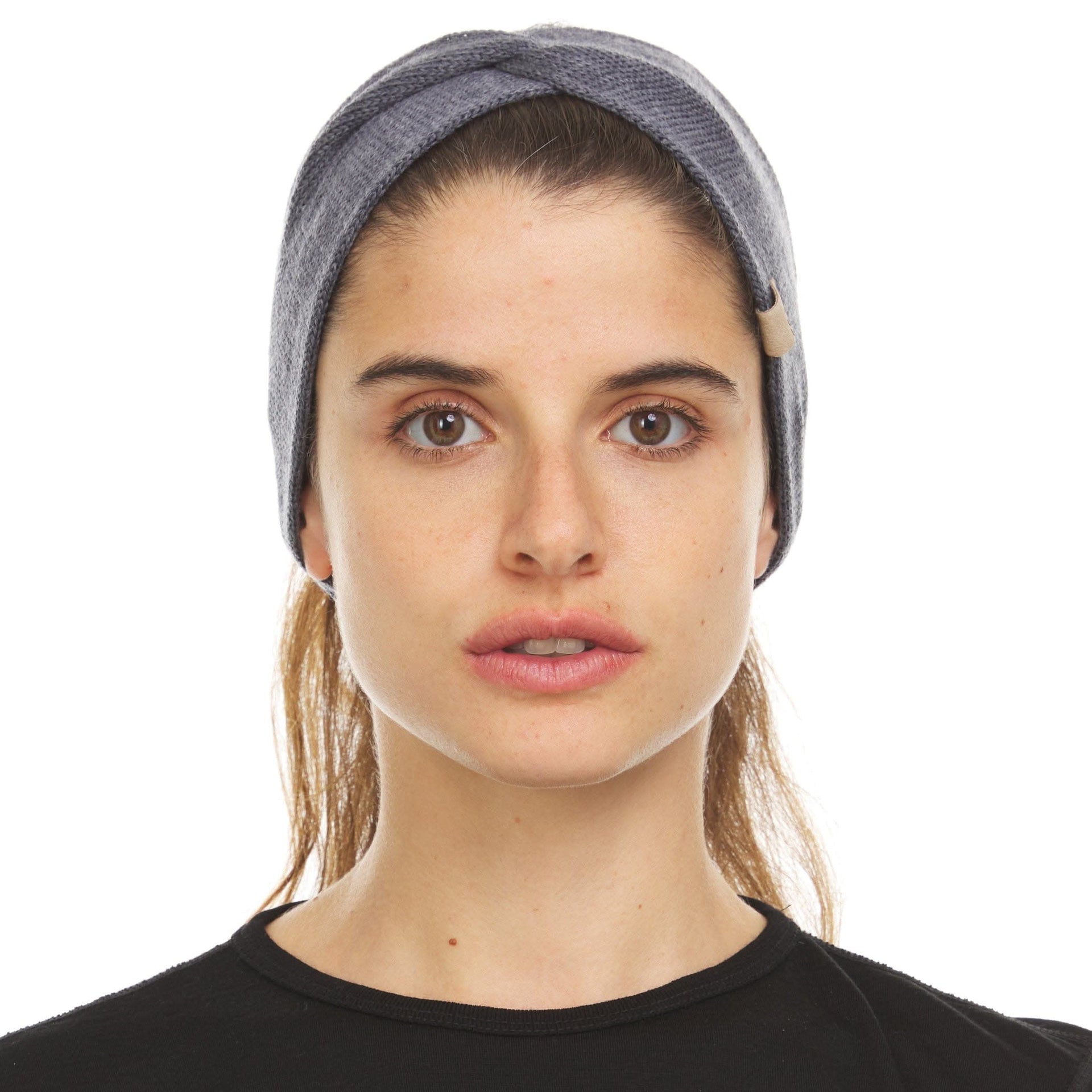 Unisex merino wool twist headband in grey, black, and cream, featuring a sporty knit design.