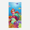 A soft microfiber beach towel featuring a colorful mermaid illustration swimming over a vibrant coral reef.