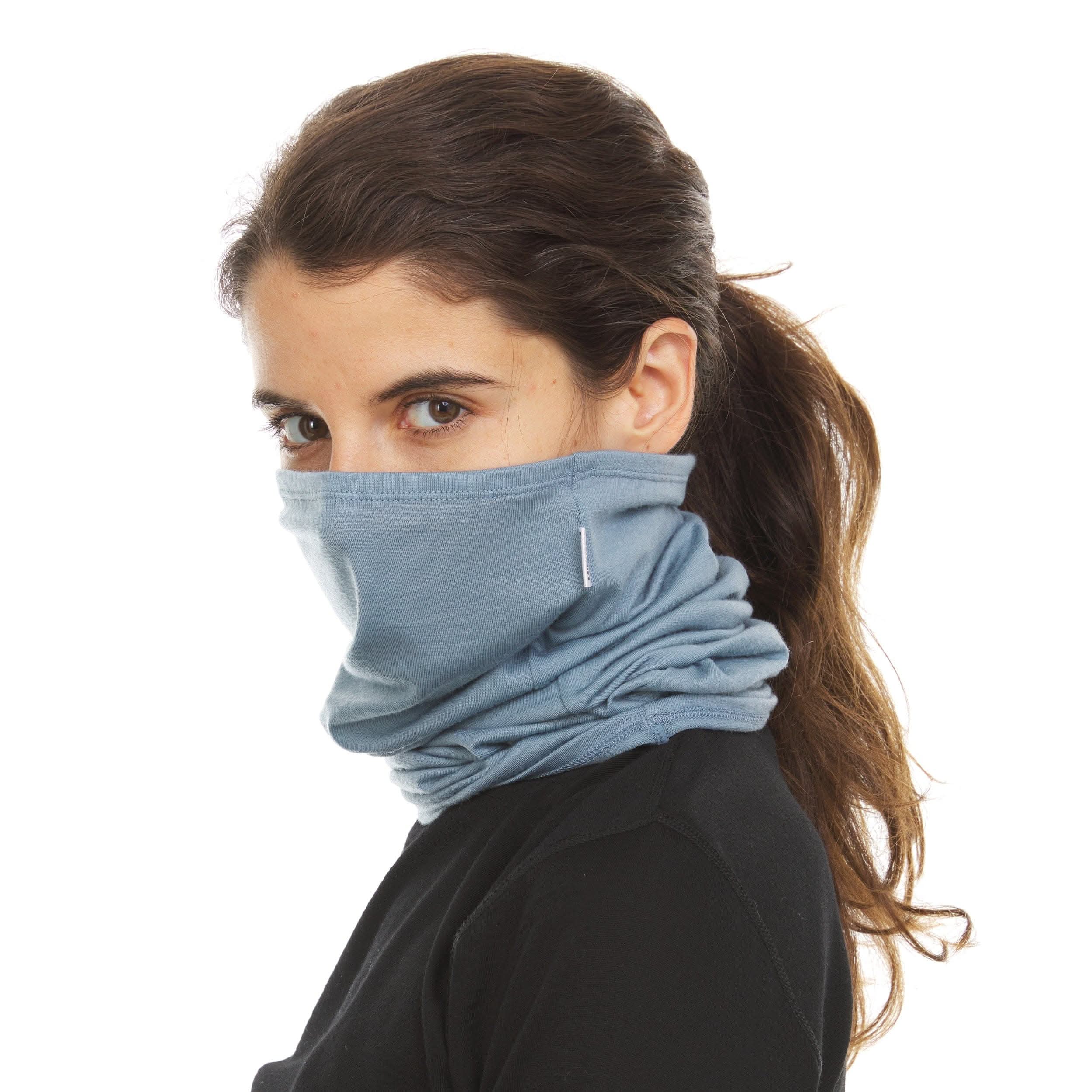 Solid grey Woolverino Multiclava shown styled as a neck gaiter