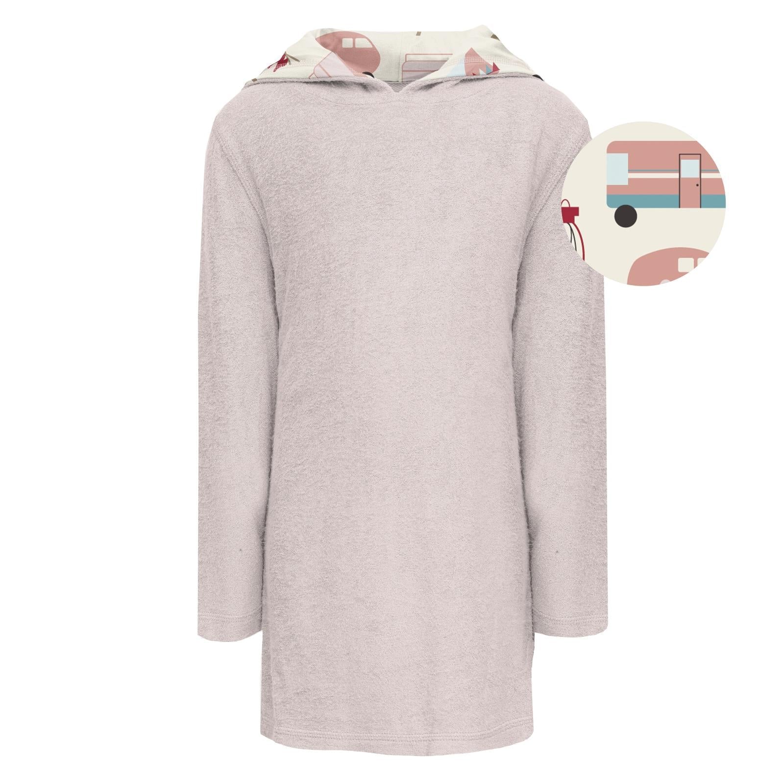Child wearing a soft oatmeal-blush Terry Pull-over After Swim Robe with a camping print hood.