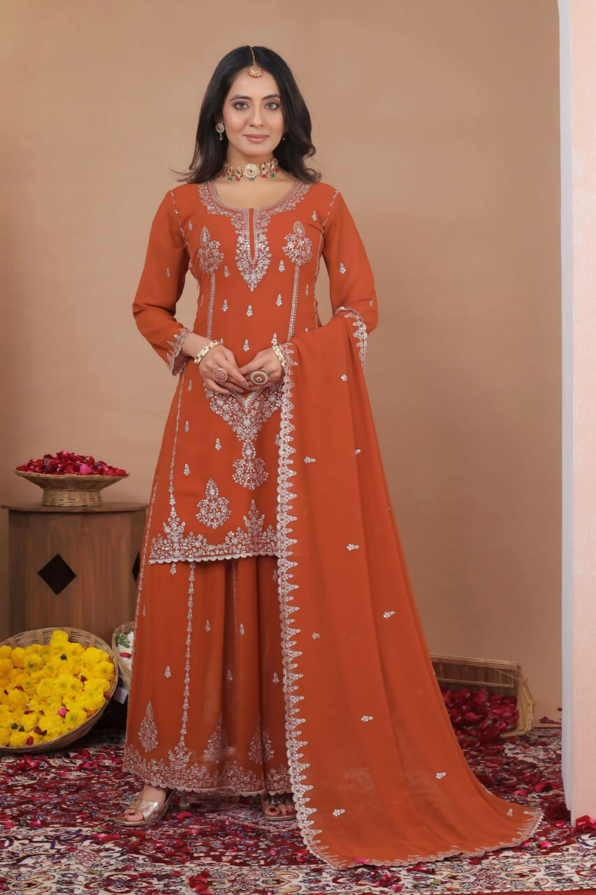 Dark orange georgette sharara set with intricate embroidery and flowy silhouette