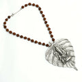 Oxidised silver-plated brass long necklace featuring a Ganesha design
