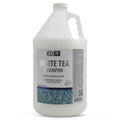 A gallon container of MODA White Tea Shampoo for professional hair care and hydration.