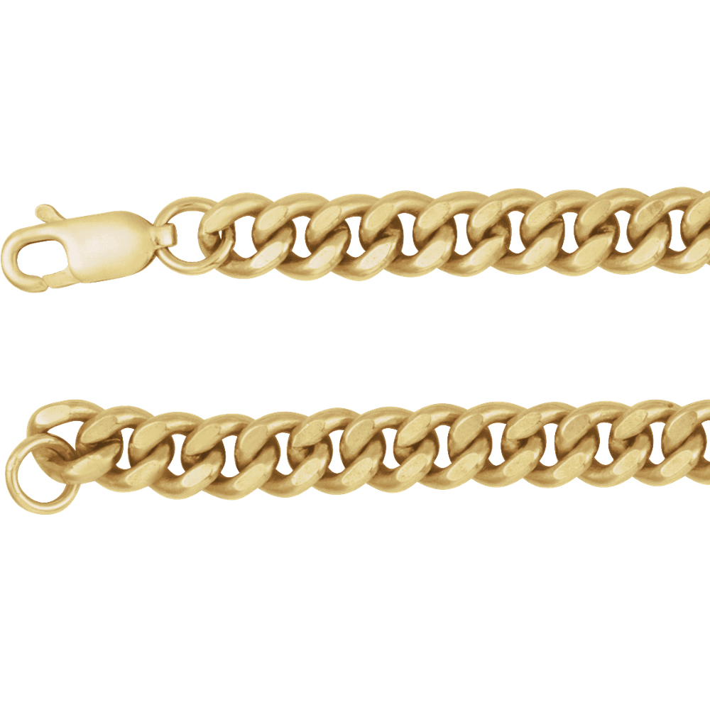 Close up of a solid 14K gold curb link chain on a neutral background.