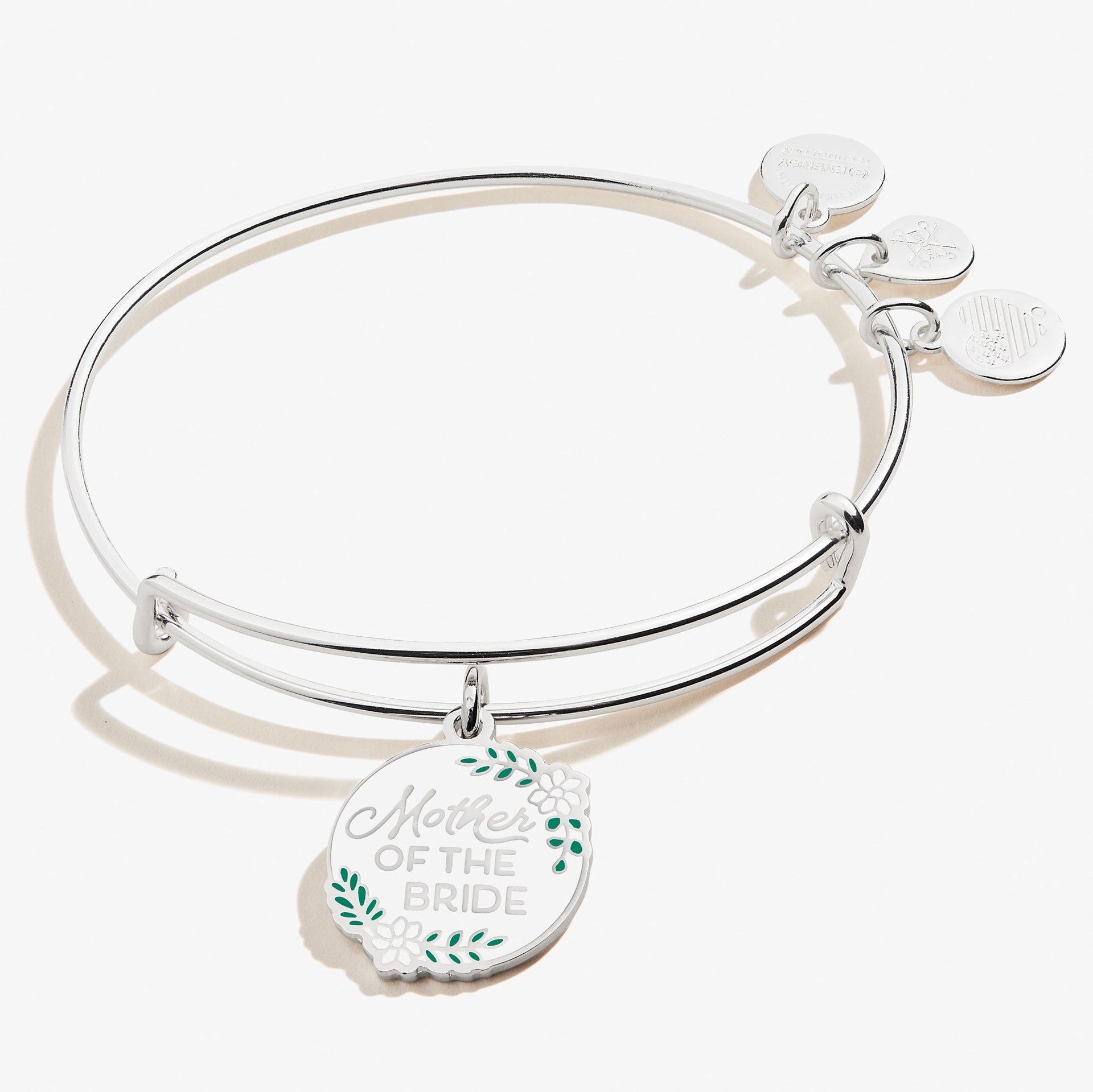 Mother of the Bride charm bangle with soft white enamel charm on a gold-tone wire.