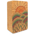 Solid brown cork yoga block with rounded edges and Mountain Magic branding