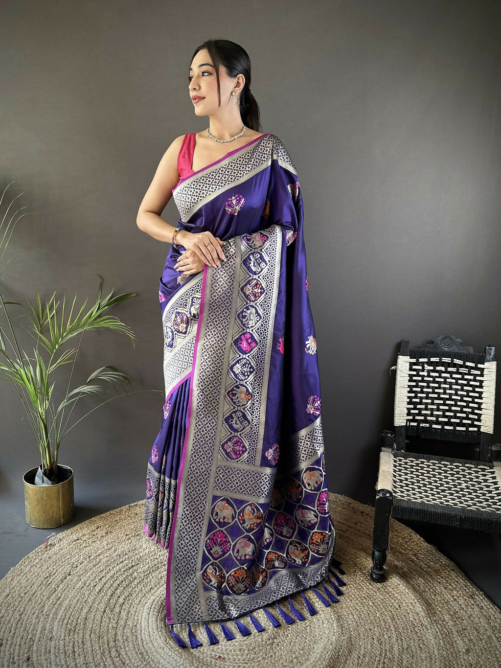 Royal blue soft Lichi silk Banarasi saree with elephant and floral motifs.