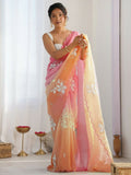 A pink and orange gold crush saree with detailed embroidery work and a matching blouse.