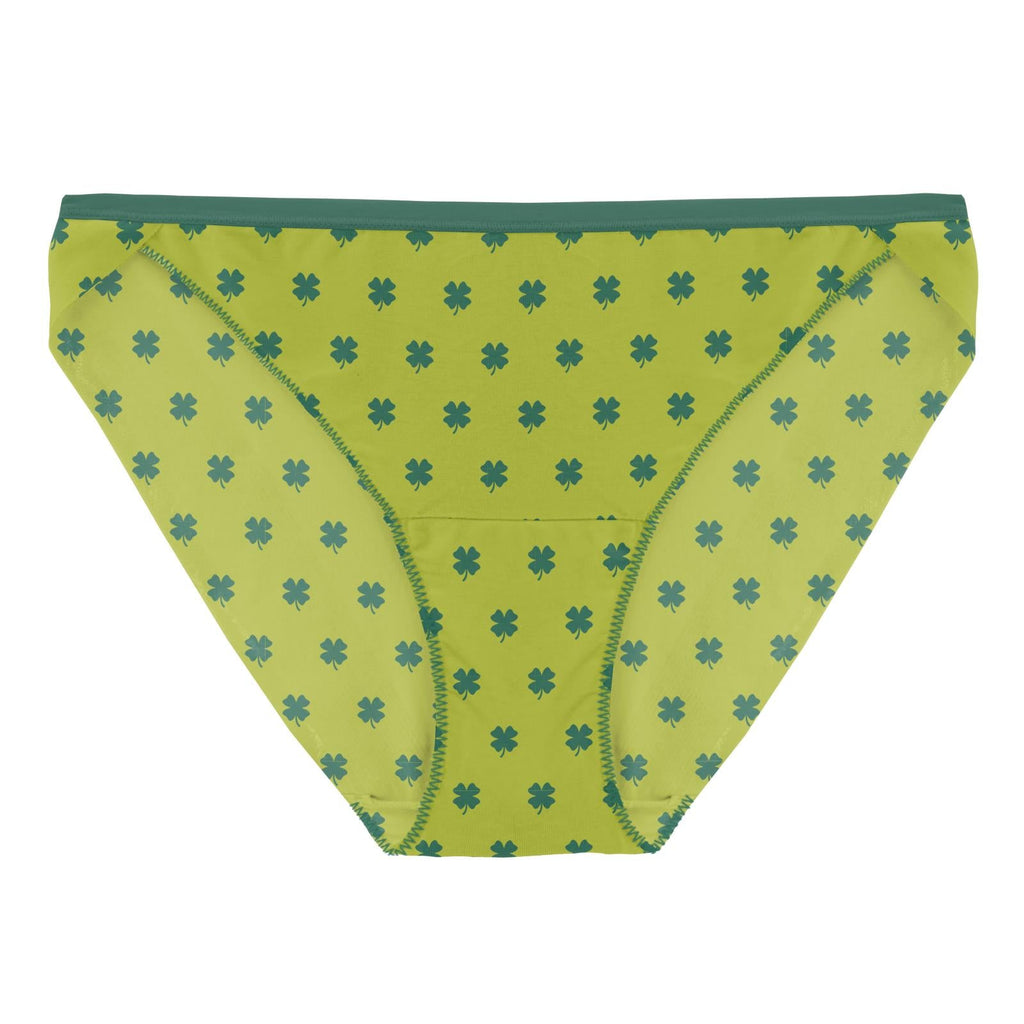 Women's low-rise bikini briefs featuring a clover pattern in Meadow Clover green