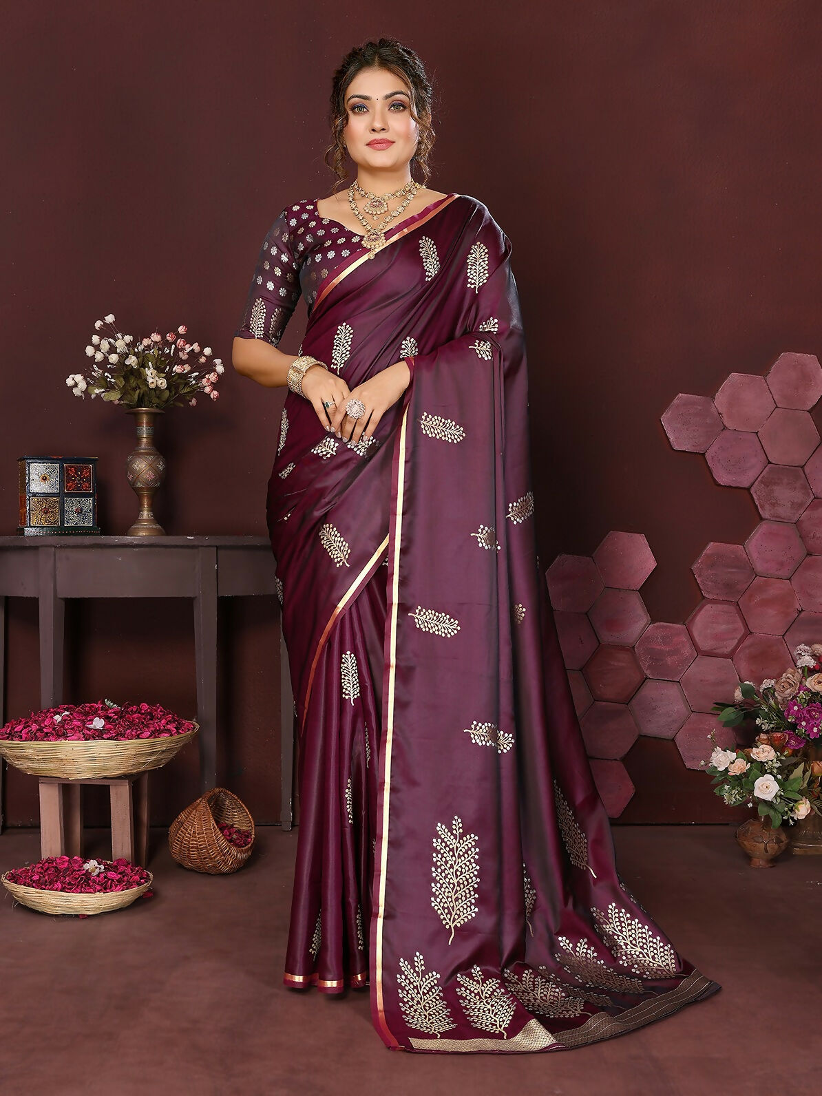 Deep wine colored Banarasi satin silk saree with floral motifs