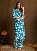 A sophisticated Rama colored printed cotton blend kurta pant set.