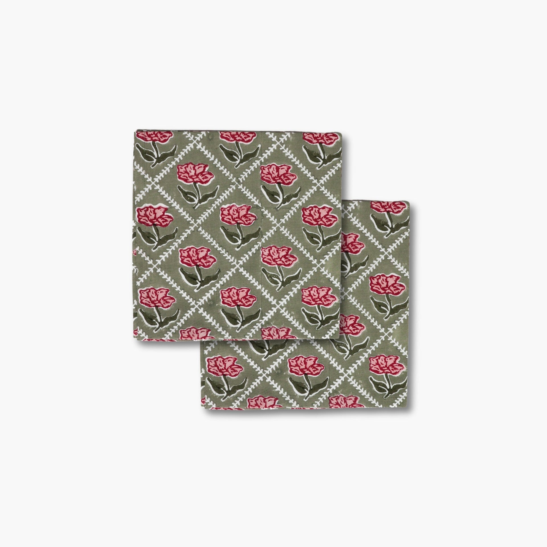 Set of two Noor cotton table napkins featuring a hand-block printed rose motif in olive green and pink.
