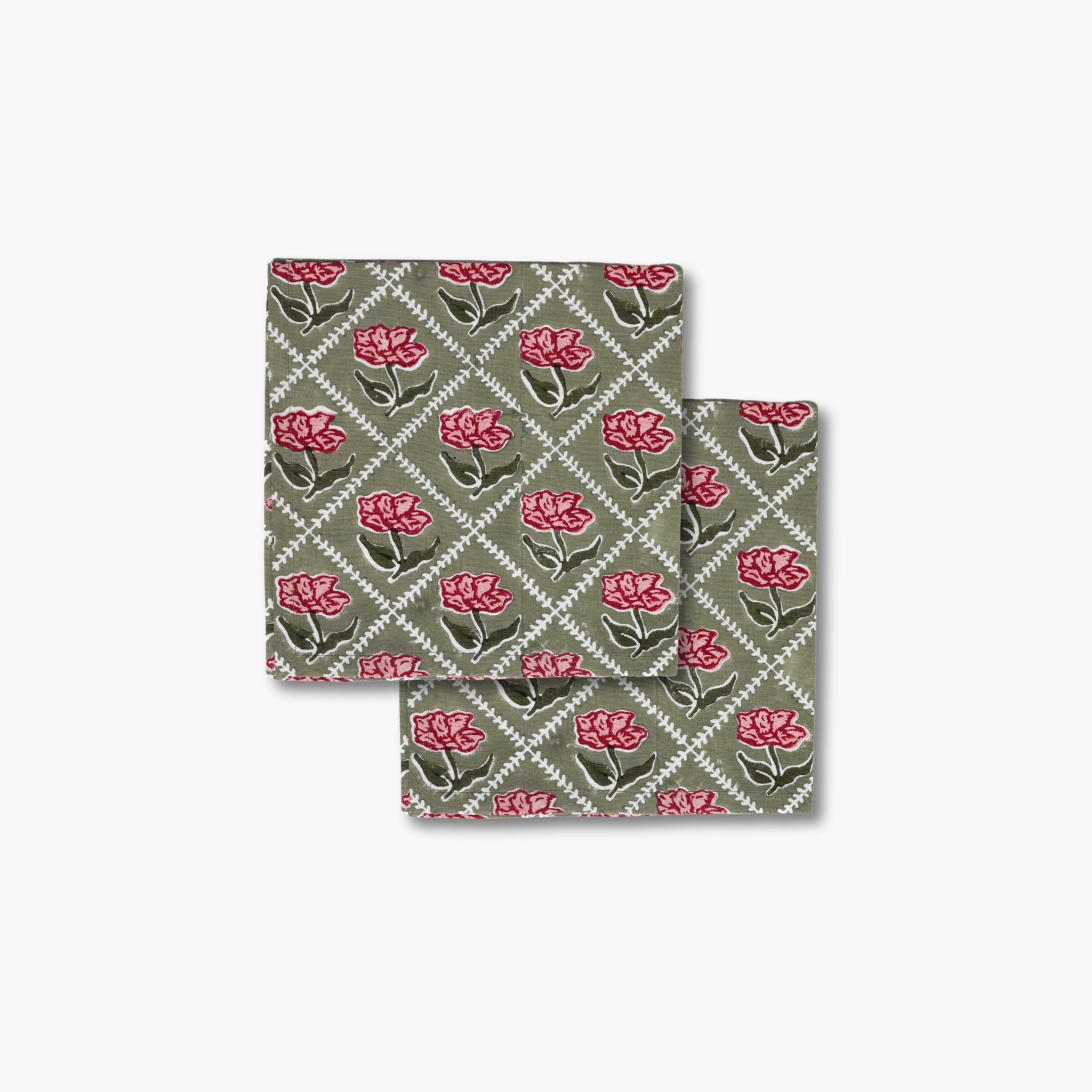 Set of two Noor cotton table napkins featuring a hand-block printed rose motif in olive green and pink.