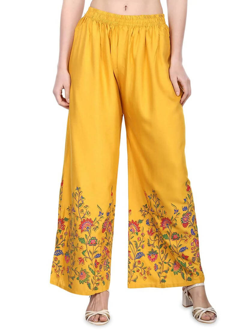 Mustard colored wide-leg palazzo pants with floral print design