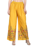 Mustard colored wide-leg palazzo pants with floral print design