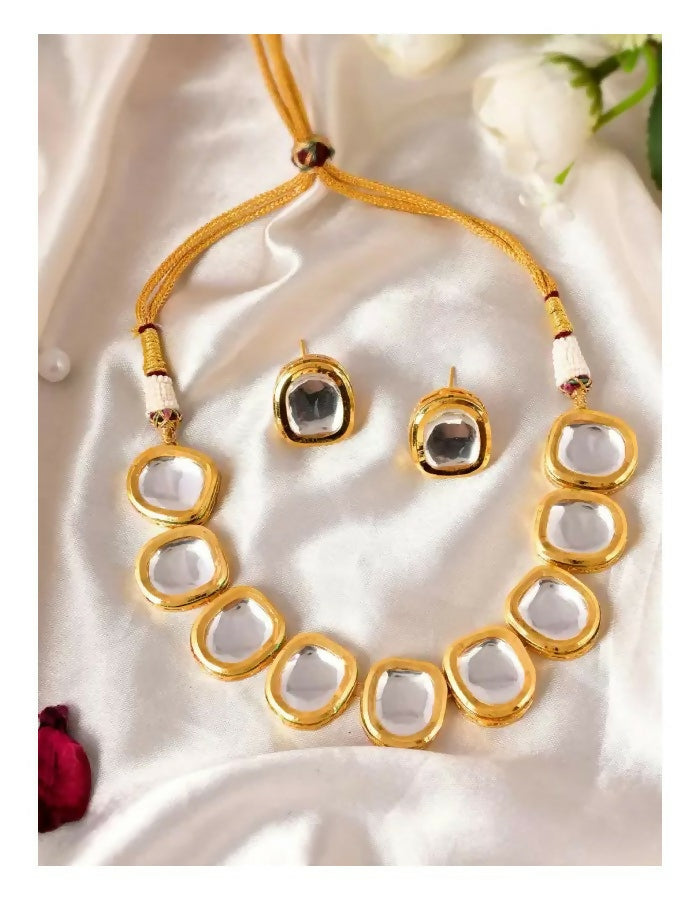 White Kundan necklace set with gold-plated finish and adjustable cord