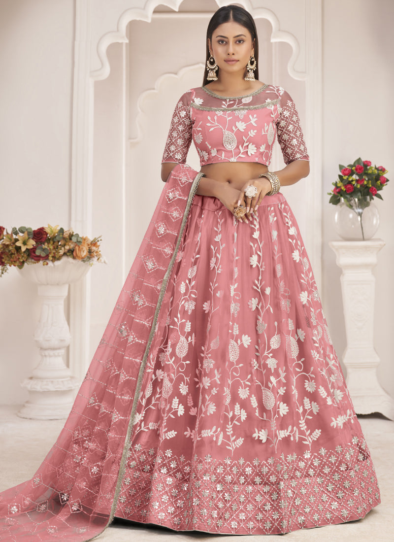 Peach butterfly net lehenga with intricate thread embroidery for wedding occasions