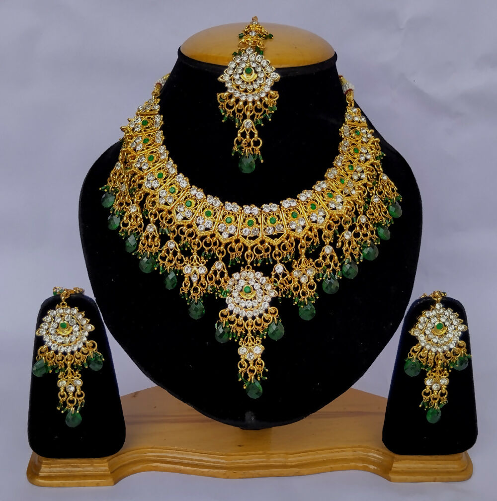 Handmade gold-plated Kundan necklace set featuring premium stone detailing