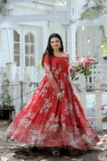 Red Anarkali dress featuring sequence and Zari embroidery in faux georgette fabric