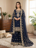 Navy blue faux georgette sharara suit featuring intricate embroidery and sequins work