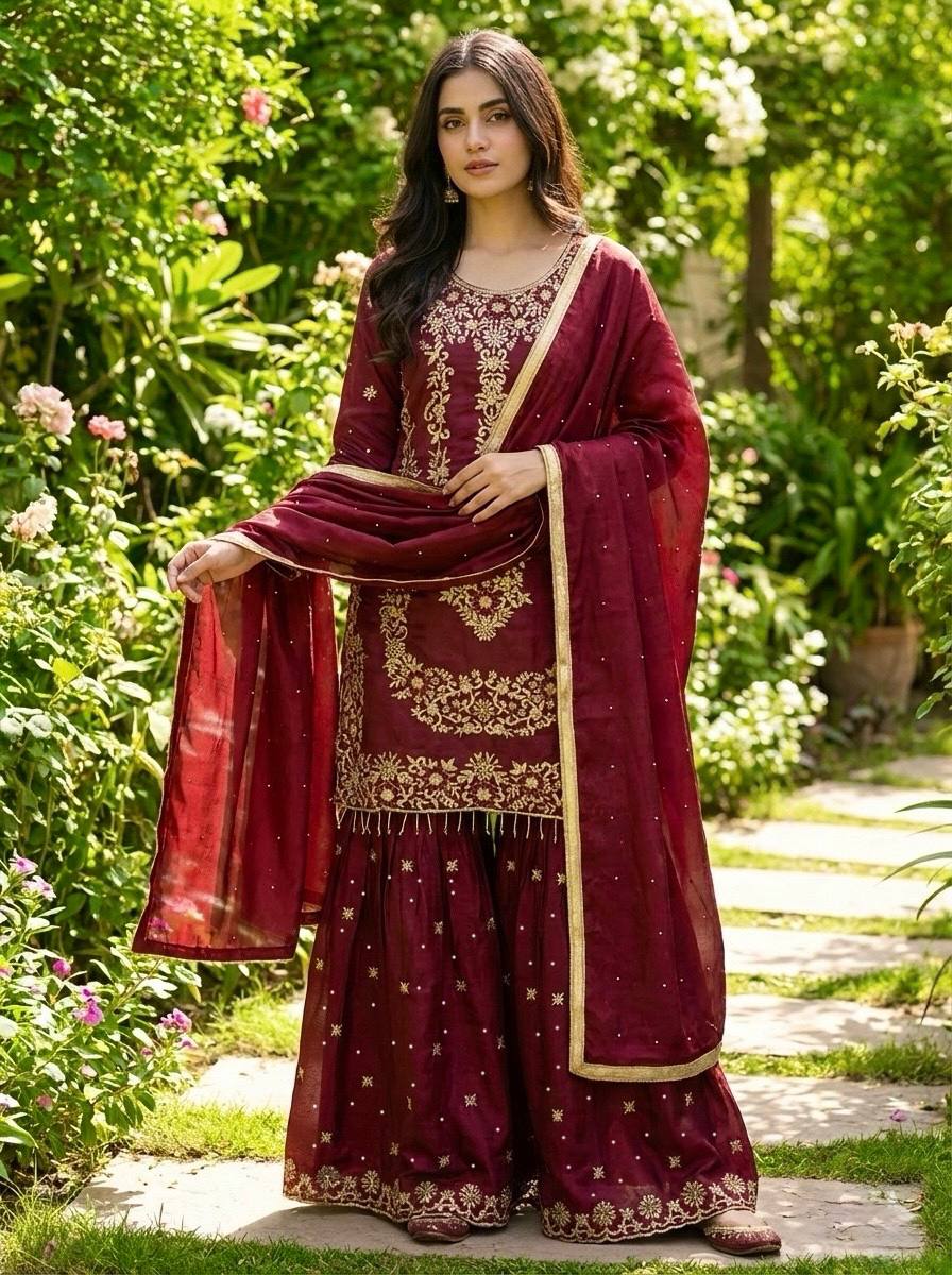 Maroon pure Jimmy Silk sharara suit with heavy embroidery and sequence work