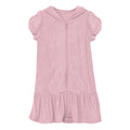 Little girl wearing a dusty lilac terry cloth ruffle swim cover-up in Cake Pop color.