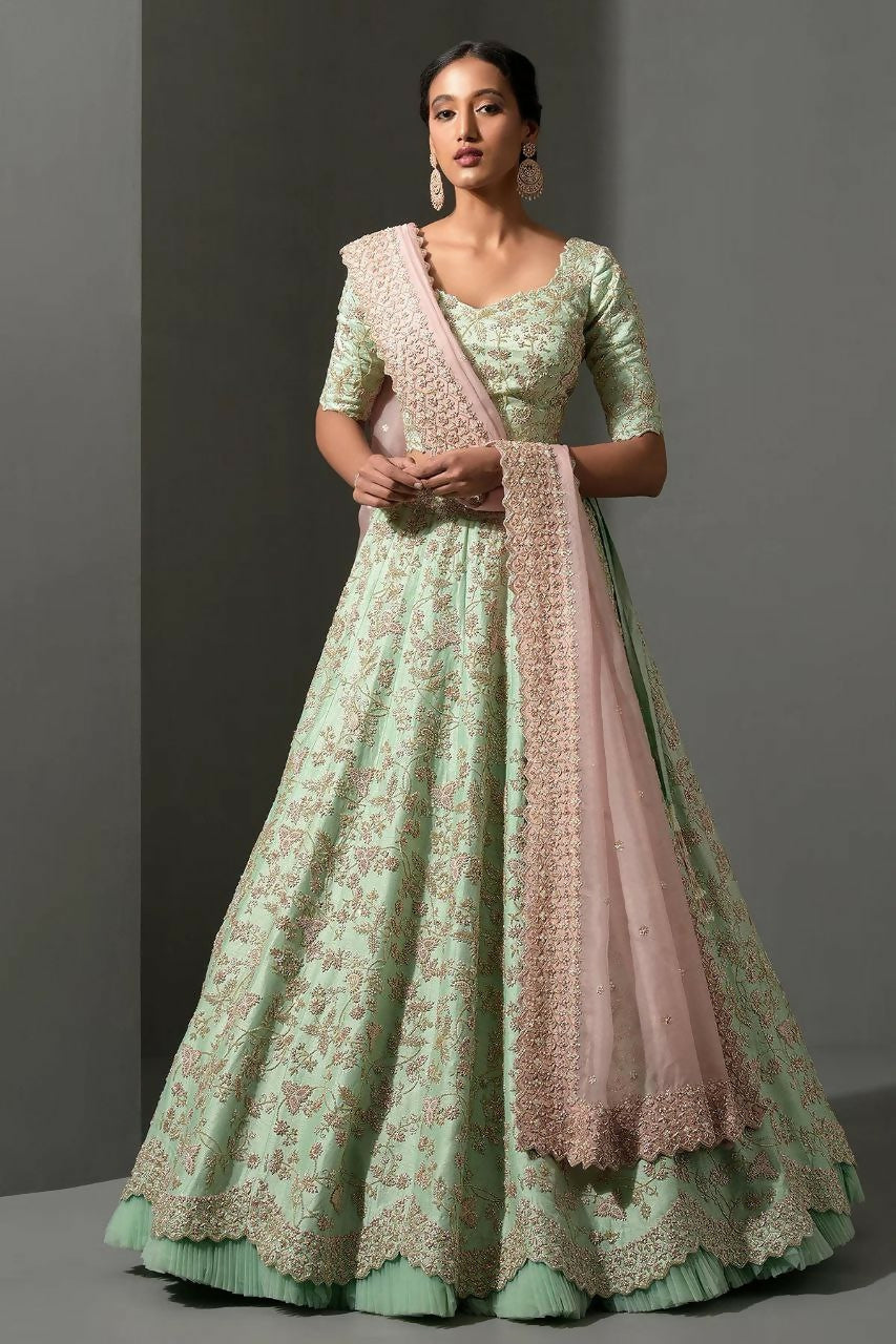Sea green Mulberry silk lehenga choli with heavy sequins, dori embroidery, and net ruffles