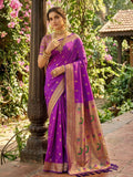 Elegant purple soft silk saree with golden blouse detailing.