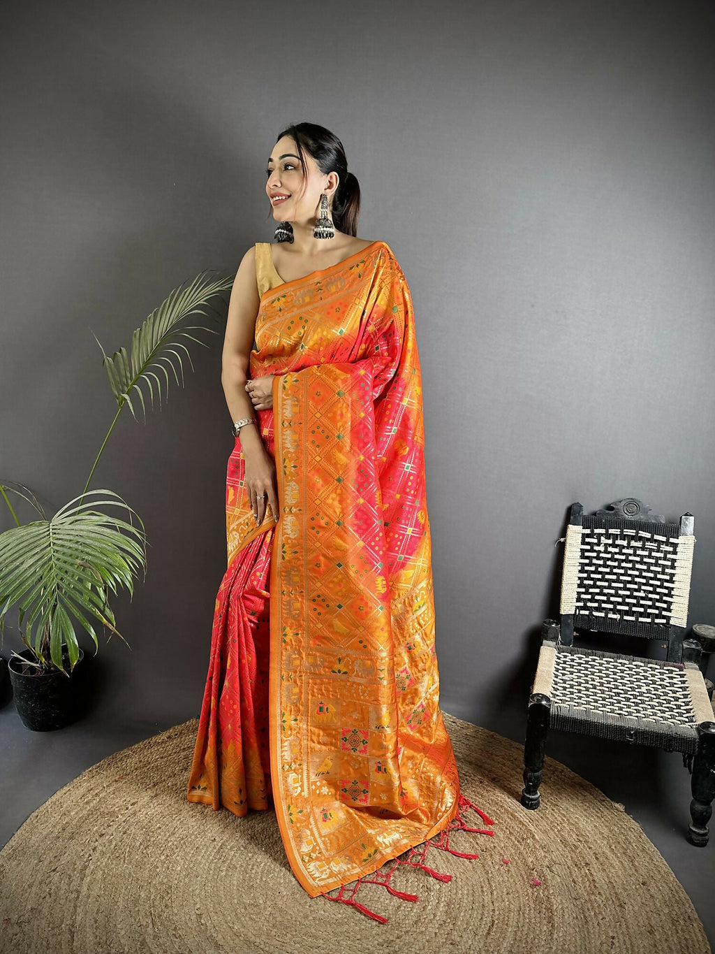 Pastel Orange soft silk patola saree with geometric pattern