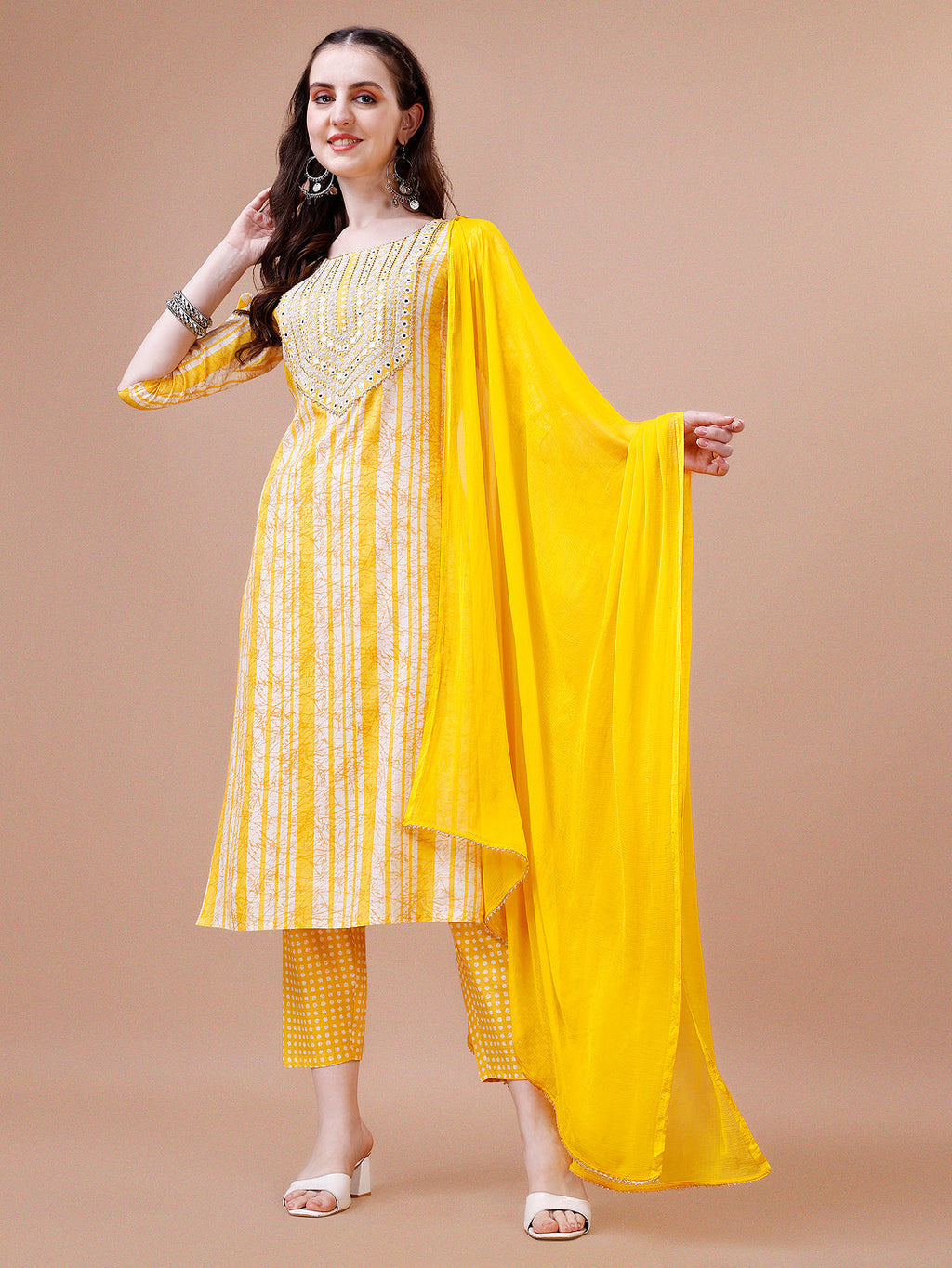Multicolor kurta set with mirror embroidery and striped print featuring a kurta, pants, and dupatta.