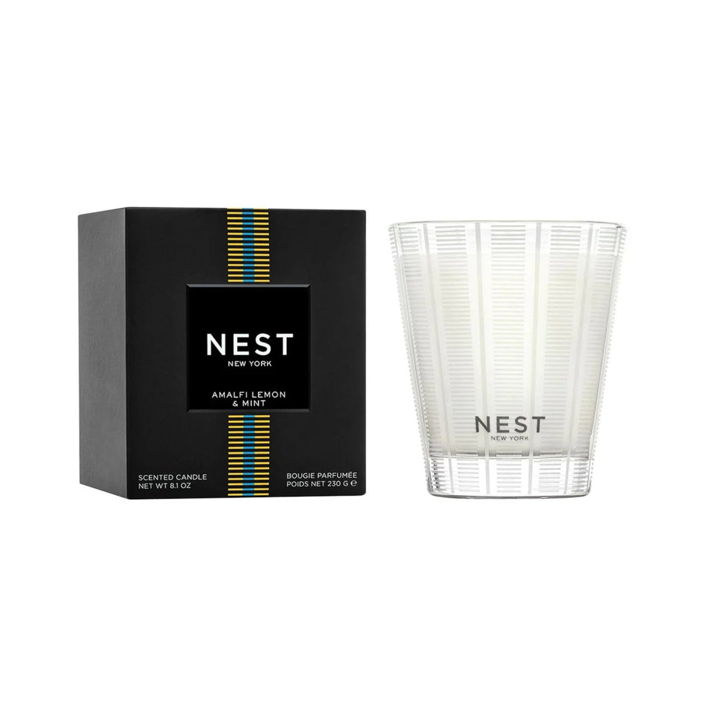 Amalfi Lemon and Mint scented candle in a glass container on a bright background