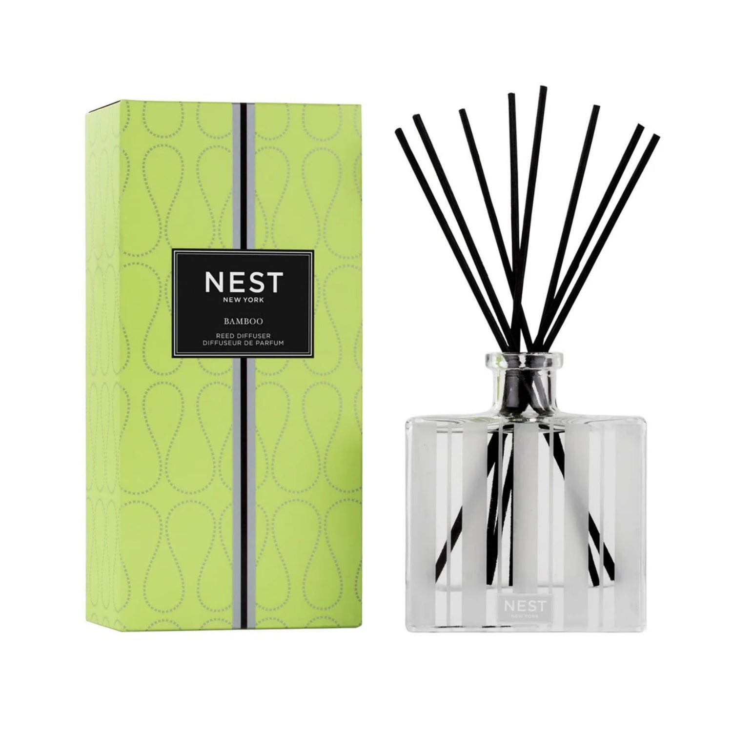 Nest New York Bamboo Reed Diffuser in a clear glass bottle with lime green label and black accents.