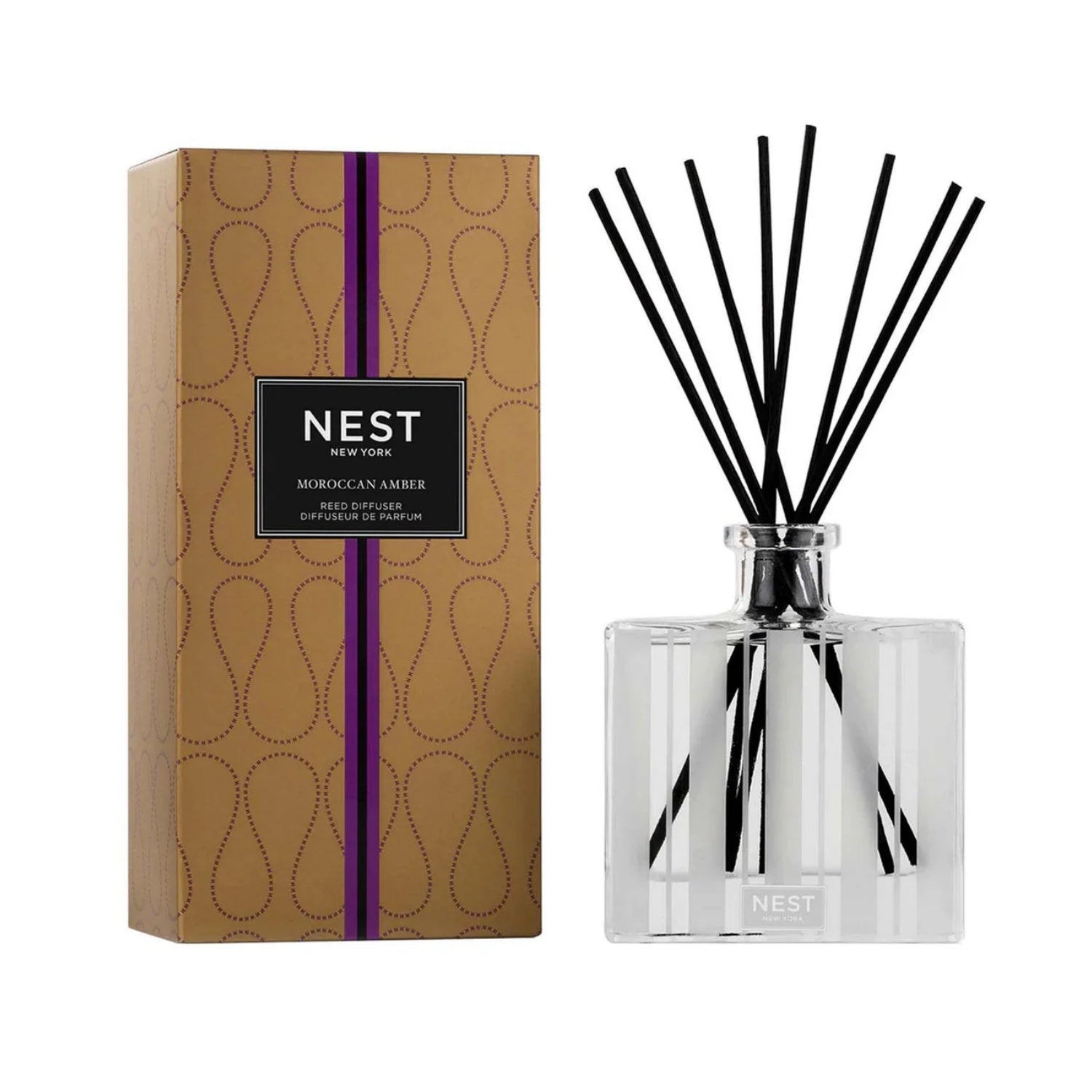Nest New York Moroccan Amber Reed Diffuser in a glass bottle with reeds, featuring notes of patchouli and bergamot.