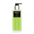 NEST New York Bamboo liquid soap in a lime green and black striped glass bottle with a chrome pump.