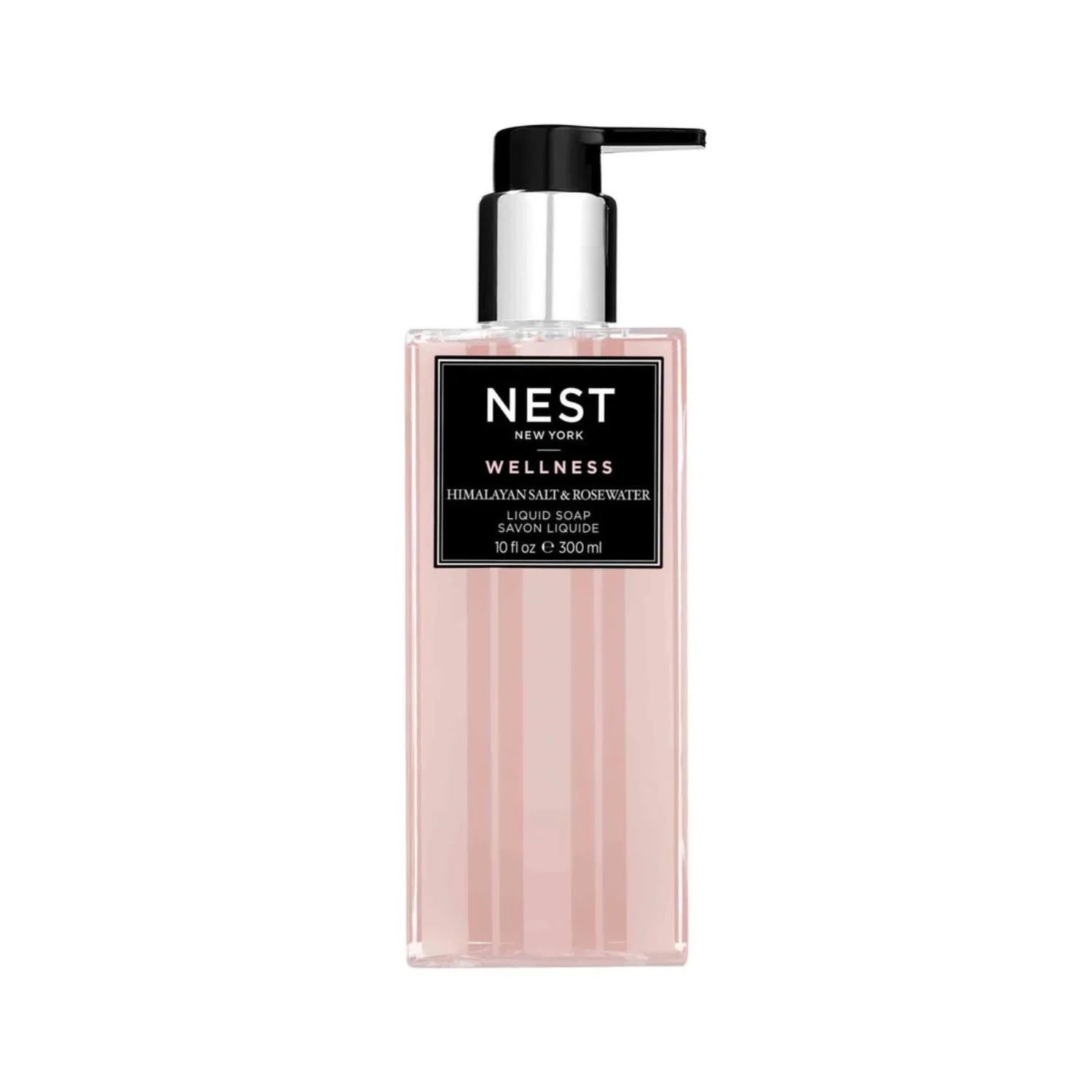 Minimalist clear bottle of Nest New York Himalayan Salt and Rosewater liquid soap with a soft pink tint on a white surface.